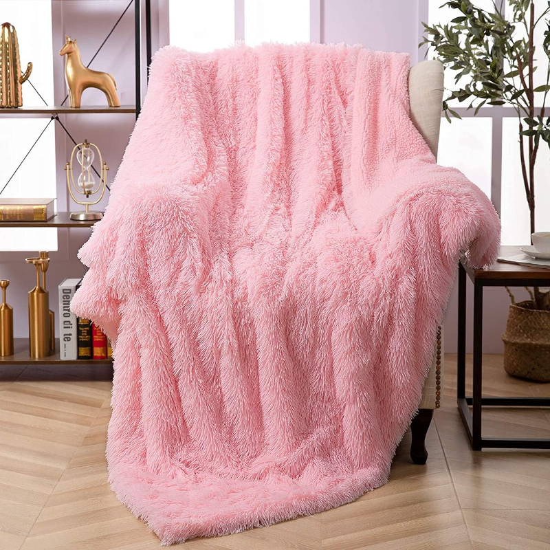 Plaid fausse fourrure rose