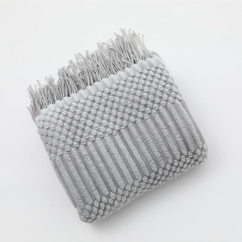 Plaid doux gris avec points en relief