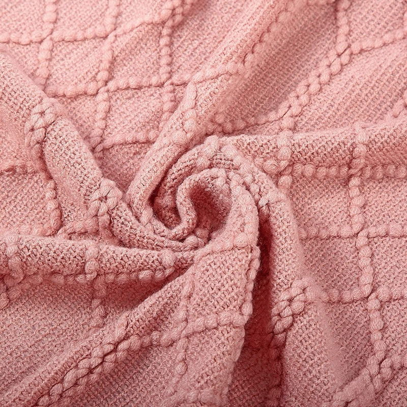 Couverture confortable en tricot rose