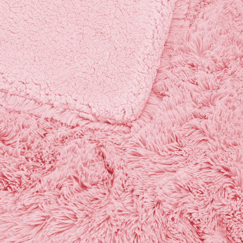 Plaid fausse fourrure rose