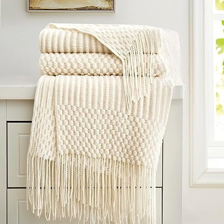 Plaid doux blanc cosy et chaleureux